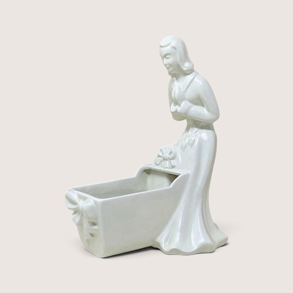 Vintage Haeger white ceramic woman and cradle planter figurine standing 11 inches tall.