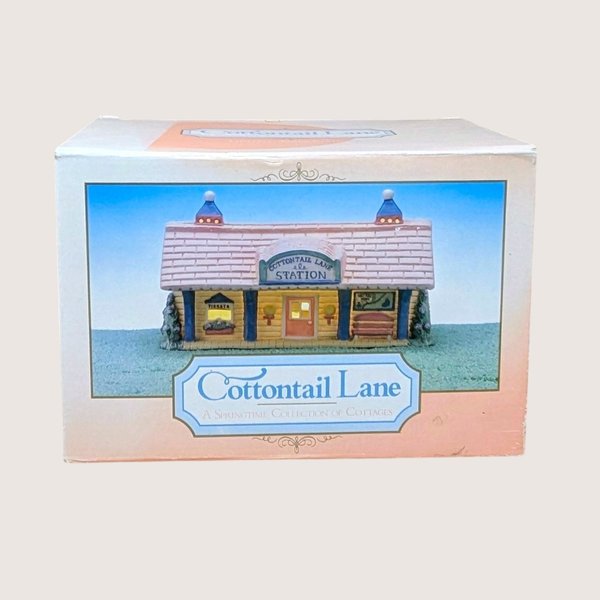 Vintage Midwest Cottontail Lane Station lighted porcelain building in its original box.