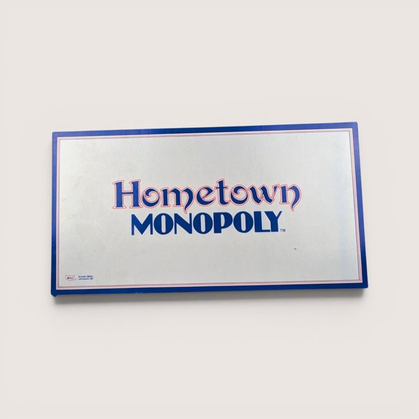 Vintage Hometown Monopoly Saint Paul MN board game box with a clean silver finish and bold blue and red lettering.