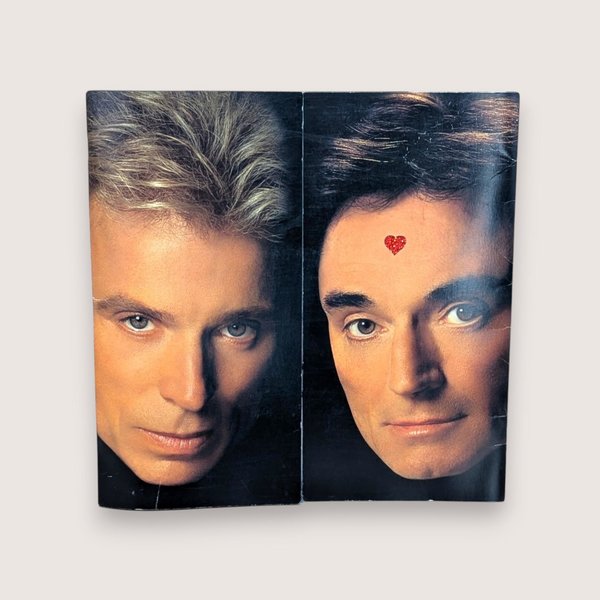 A vintage square souvenir program book for Siegfried and Roy at The Mirage.