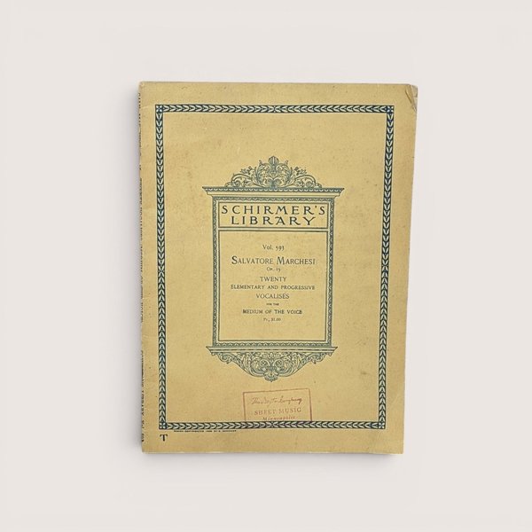 1927 Schirmer's Library Salvatore Marchesi Twenty Elementary and Progressive Vocalises music book cover with local store stamp.