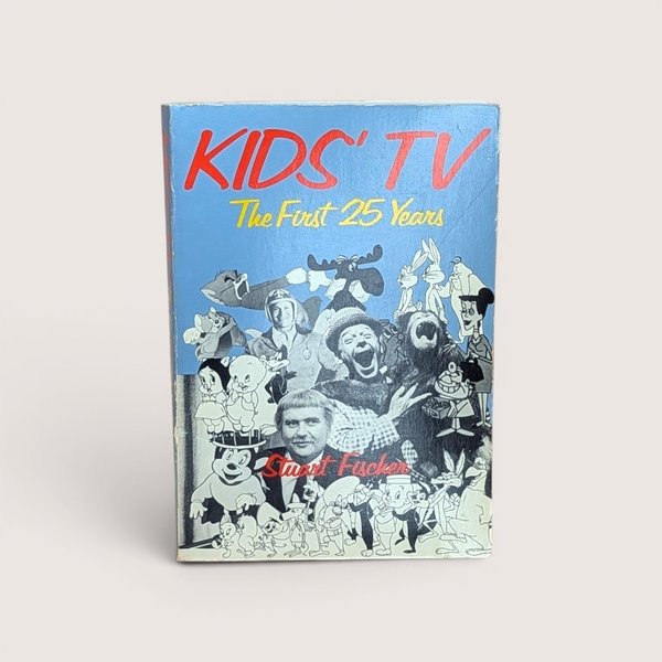 The cover of the book Kids TV The First 25 Years by Stuart Fischer featuring various classic cartoon characters.
