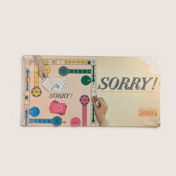 Vintage Sorry board game box cover featuring the classic game board layout with hands holding retro game cards.