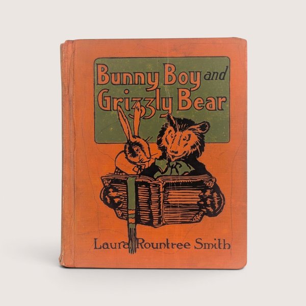 Antique orange hardcover edition of Bunny Boy and Grizzly Bear by Laura Rountree Smith with a rabbit and bear illustration.