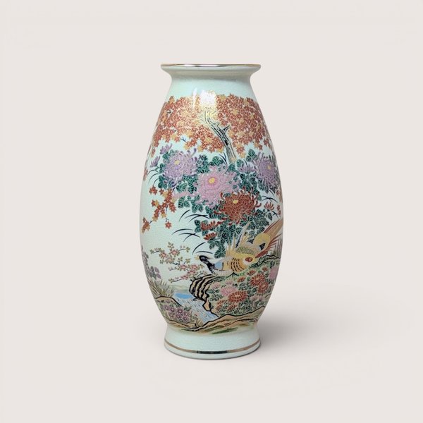 A hand-painted Japanese Meito porcelain vase featuring a pheasant bird amid colorful chrysanthemums and maple trees.
