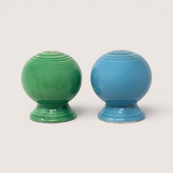 Vintage Fiesta ball salt and pepper shaker set in green and turquoise ceramic glazes.