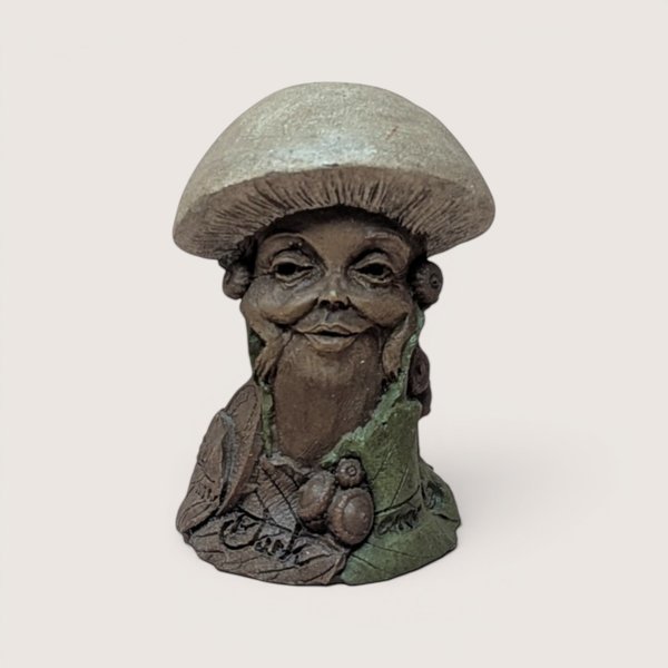 1990 signed Tom Clark "Creola" gnome figurine by Cairn Studios featuring a gnome character sheltered by a mushroom cap.