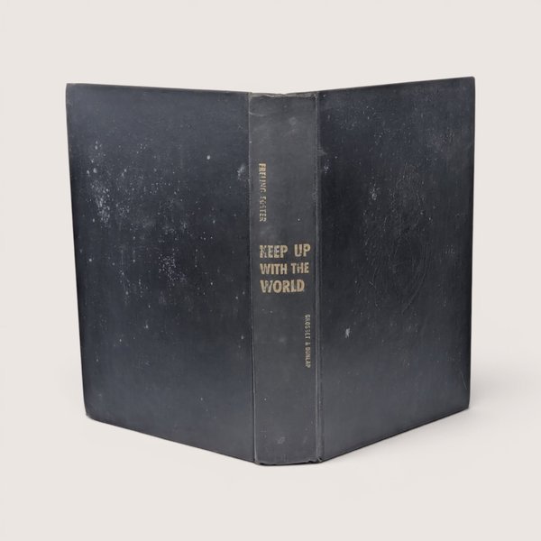 Vintage 1949 edition of Keep Up with the World hardcover book with dark cover and gold spine lettering.