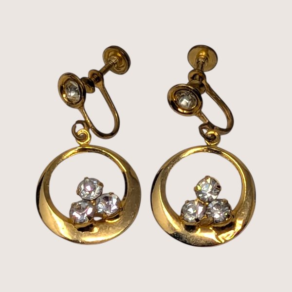 Pair of vintage 1950s gold-tone screw-back drop earrings with circular hoops and sparkling rhinestones.