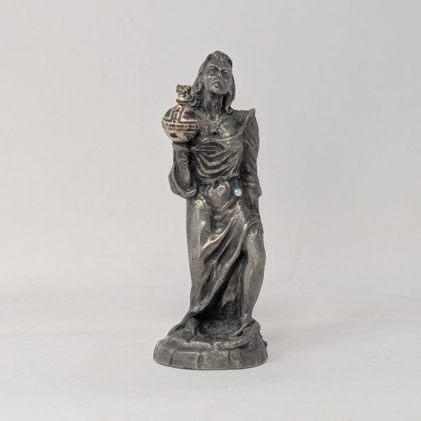 Front view of a vintage Weatherby pewter sovereign figurine holding an ornate orb with a rhinestone accent.