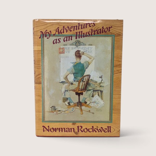 Vintage 1988 hardcover book titled My Adventures as an Illustrator by Norman Rockwell with its dust jacket featuring the Saturday Evening Post triple self-portrait.
