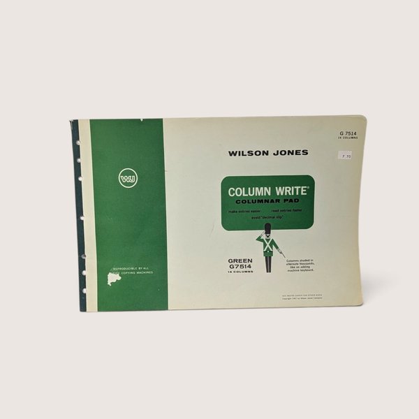 A vintage Wilson Jones Column Write G7514 columnar pad featuring a green and white cover with a guardsman graphic and copyright date of 1967 against a neutral background.