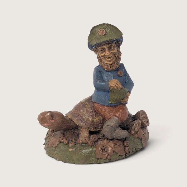 A vintage 1994 Tom Clark resin gnome figurine titled No Passing Zone riding a turtle against a neutral background.