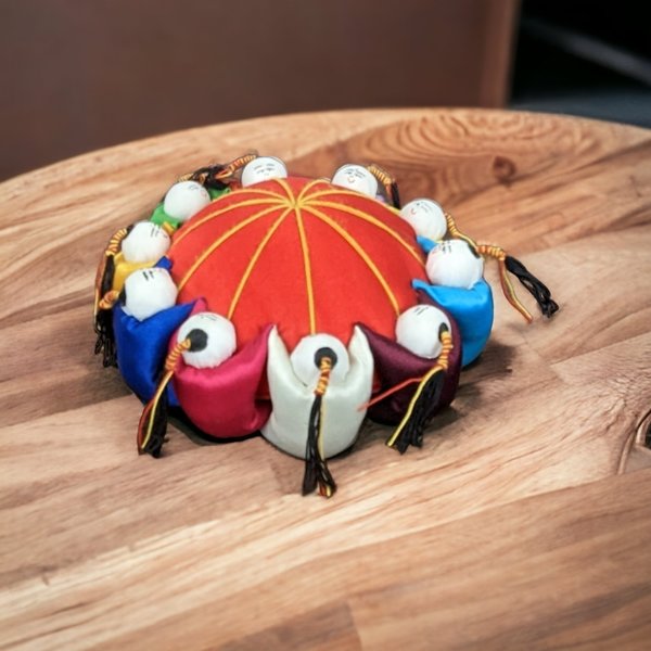 Asian Pin Cushion: Adorned by 10 Delightful Figures