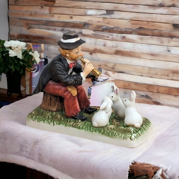 Whimsical Harmony: 1993 Melody in Motion 'Charmed Bunnies' Figurine