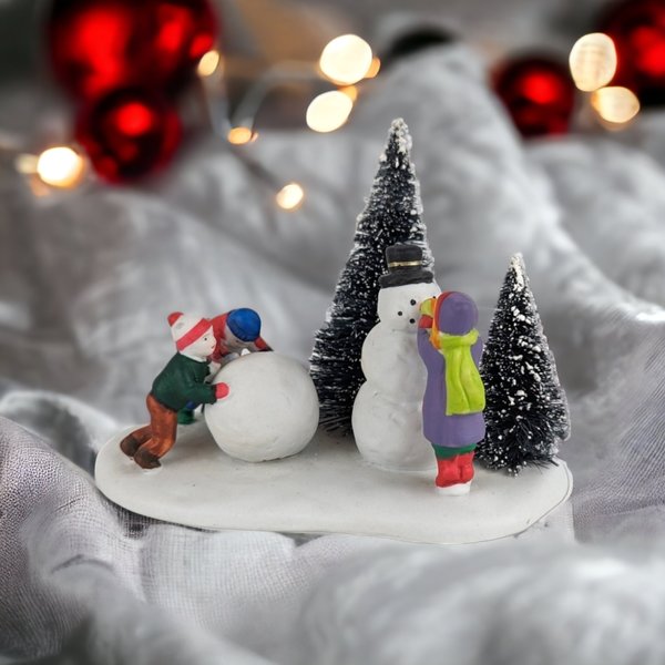 Frosty Fun: 1996 Lemax Village Children Building Snowmen Figurine