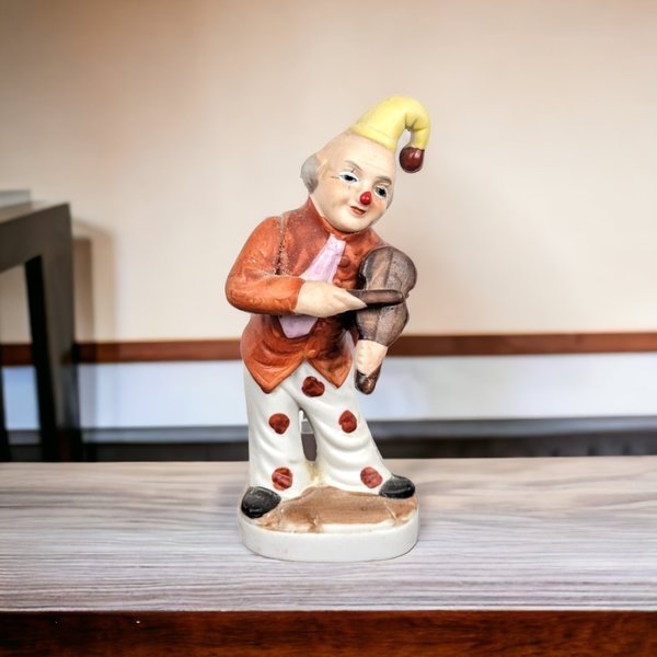 Whimsical Nostalgia: Vintage Ceramic Violin Clown Figurine