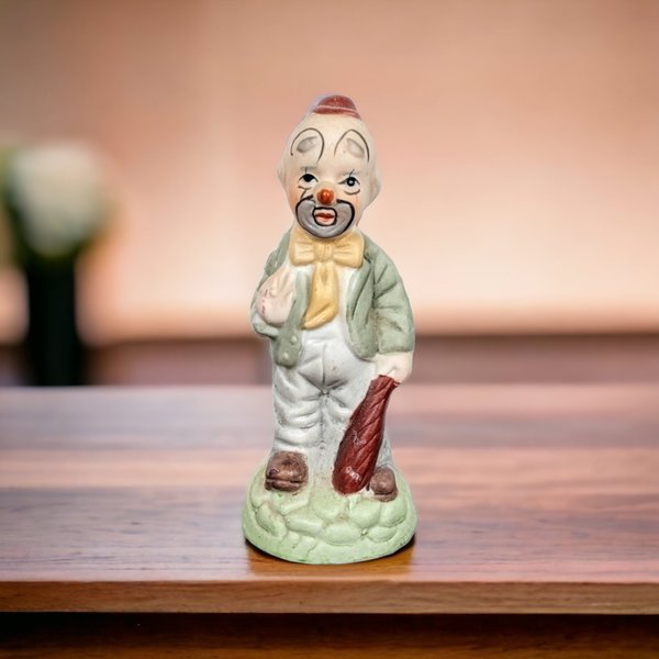 Vintage Ceramic Hobo Clown Figurine with Bat: Whimsical Collectible