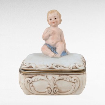 Vintage Bisque Porcelian Trinket Box with Baby Sitting on Top.