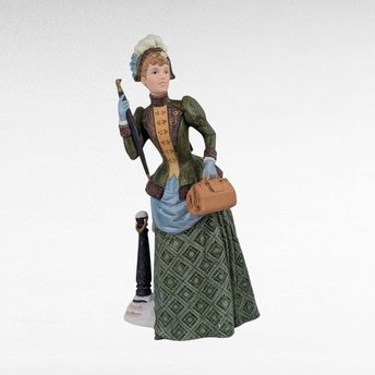 1987 Avon Mrs. Albee Lady Figurine Award.